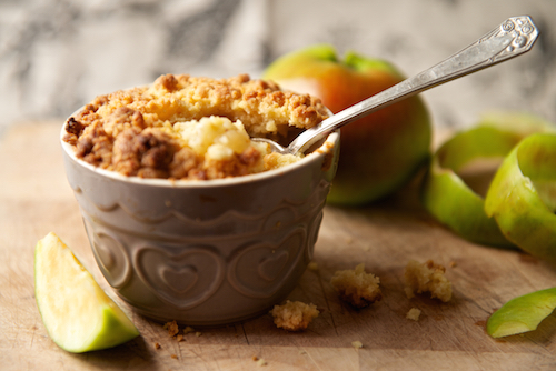 Goat's Cheese Apple Crumble with an apple peel in the background